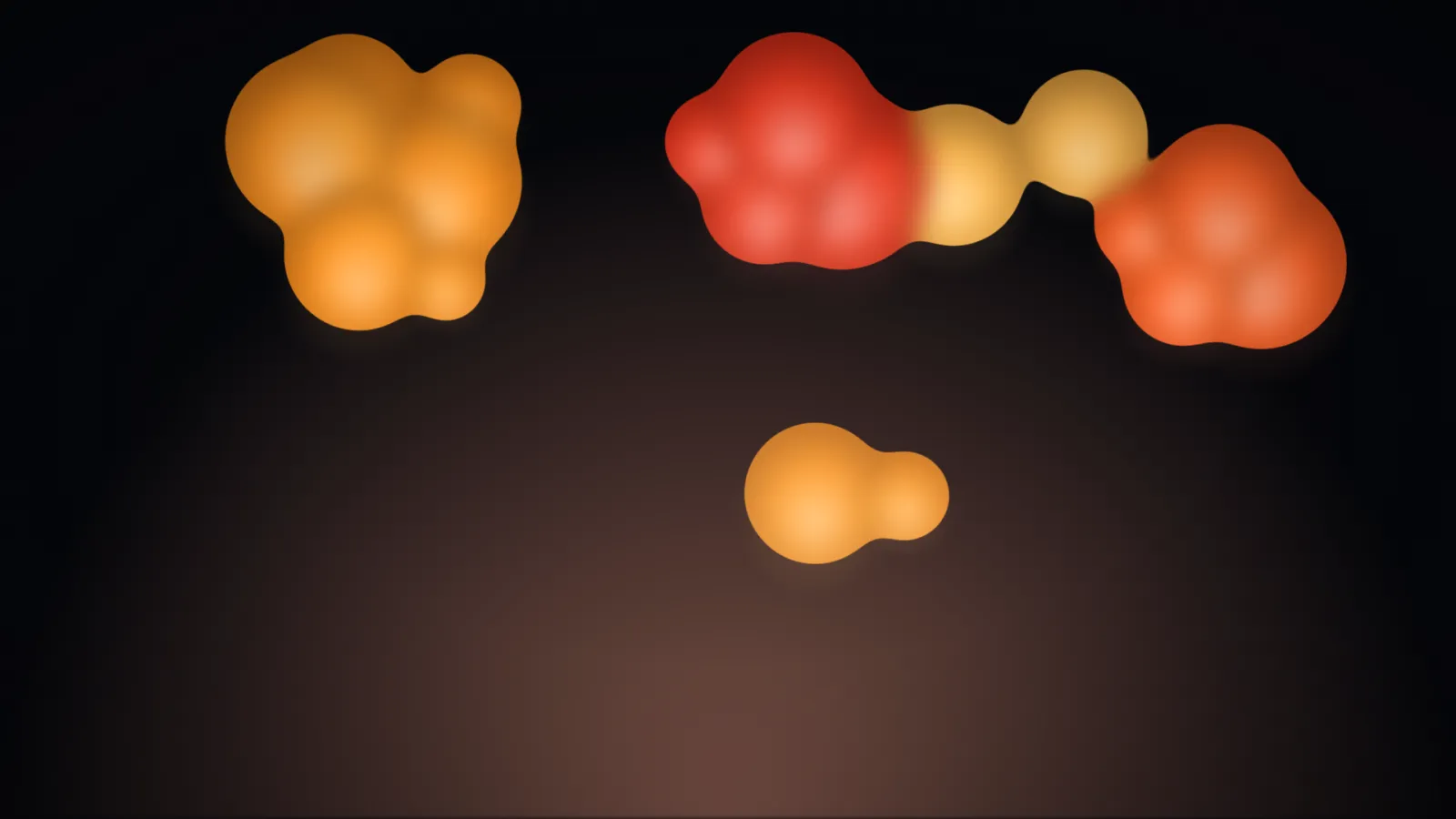 Lava on the classic palette: four soft-edged orange and red blobs on black, two pairs caught mid-merge into single gooey shapes.